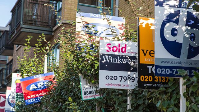 Article thumbnail: 'To let' and 'for sale' Signs outside a block of flats in Hackney, London