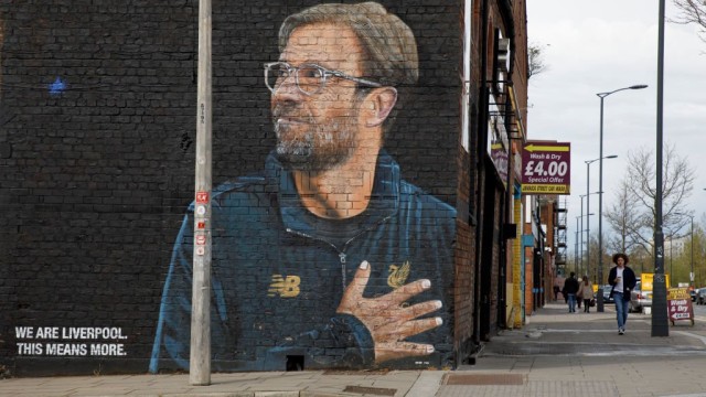 Article thumbnail: A mural of Liverpool FC manager Jurgen Klopp by the street artist "Akse" in Liverpool's Baltic Triangle (Photo: Tom Jenkins/Getty Images)